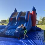 We would say he is ready for this Red and Blue bounce house rental